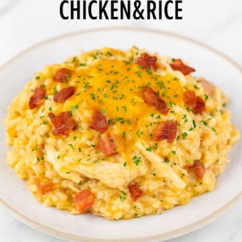 A creamy slow cooker crack chicken and rice casserole with melted cheese on top