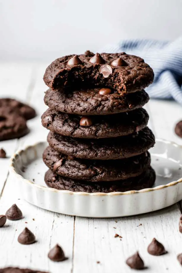 Gluten-free double chocolate chip cookie ingredients on a marble table.